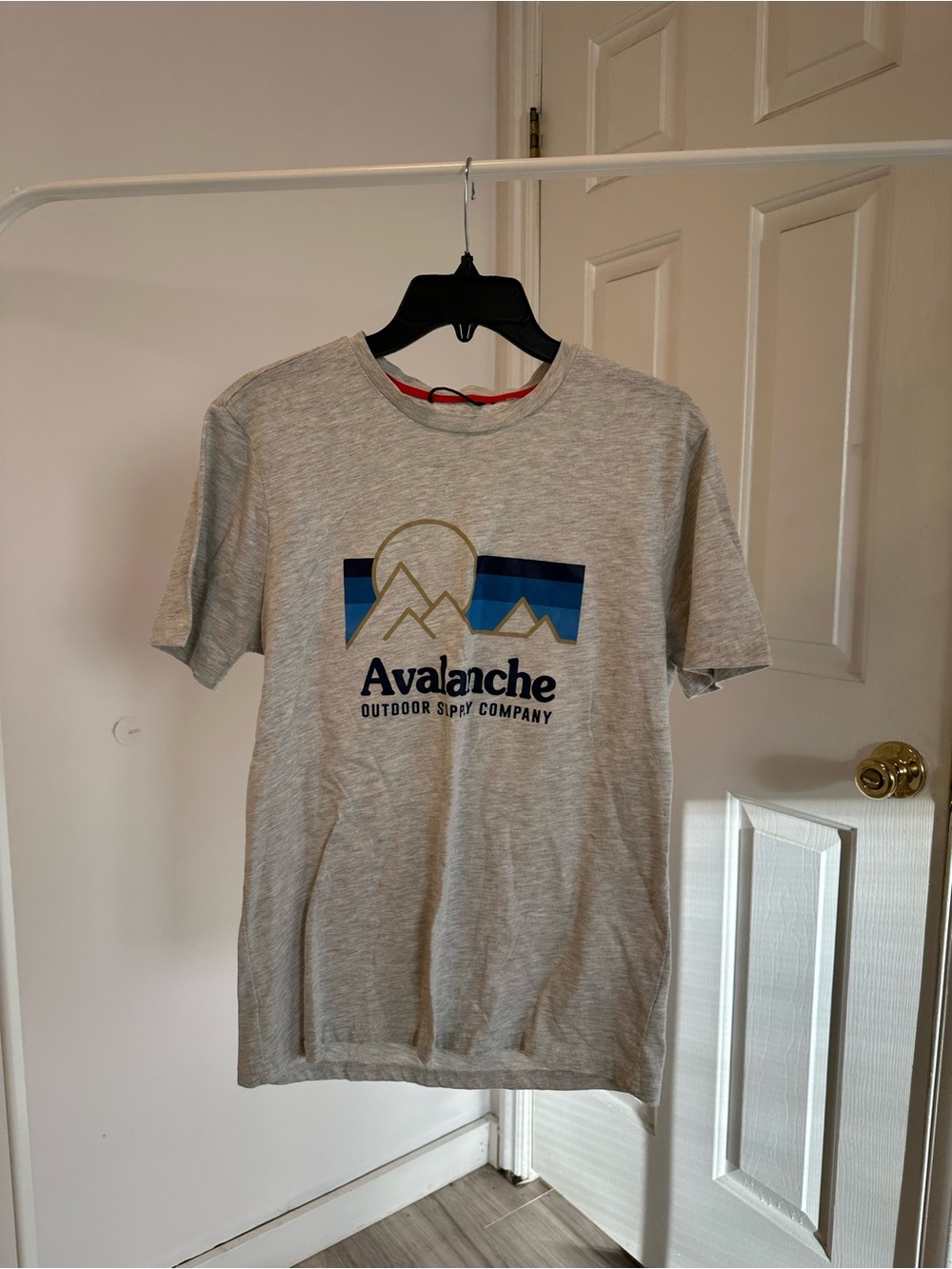 Avalanche Light Gray Tee with Blue & Gold Mountain Graphic